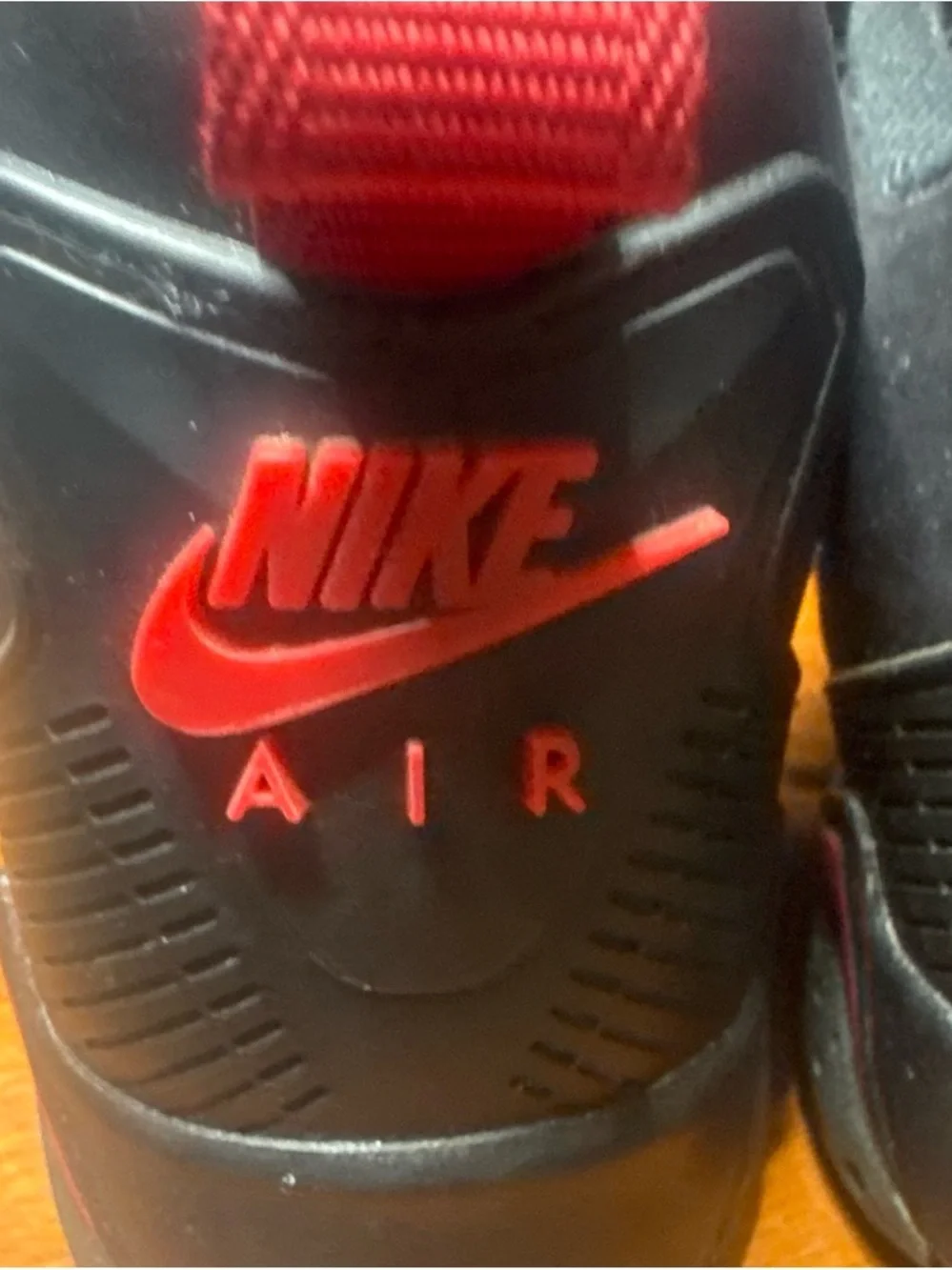 Jordan Black Sneakers with Red Jumpman Accent